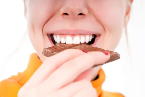 woman eating chocolate