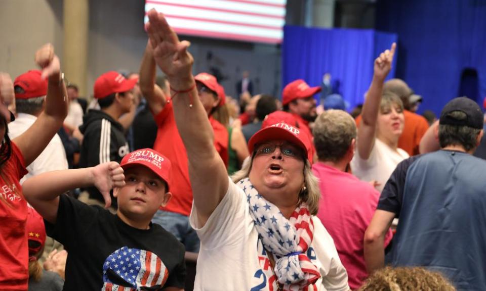 People turn to make their feelings known toward the media covering Donald Trump during a ‘Evangelicals for Trump’ campaign event held at the King Jesus International Ministry on 3 January 2020 in Miami, Florida.