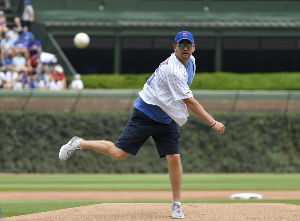 Jul 19, 2019; Chicago, IL, USA; Toronto Raptors head coach Nick Nurse throws a ceremonial first pitch before the game between the Chicago Cubs and the San Diego Padres at Wrigley Field. Mandatory Credit: Quinn Harris-USA TODAY Sports