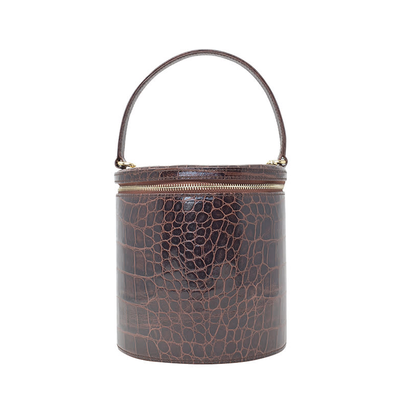 <a rel="nofollow noopener" href="https://staud.clothing/products/vitti-bag-1" target="_blank" data-ylk="slk:Vitti Bag in Faux Croc, Staud, $500The faux-croc version lends an ultra-luxe vibe to any look.;elm:context_link;itc:0;sec:content-canvas" class="link ">Vitti Bag in Faux Croc, Staud, $500<p>The faux-croc version lends an ultra-luxe vibe to any look.</p> </a>