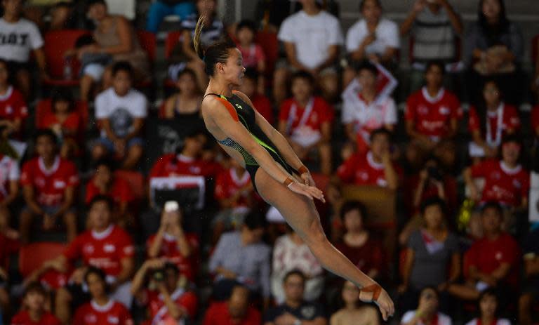 Pandalela Rinong of Malaysia competes in the women's 10m platform diving final at the 2015 SEA Games. (PHOTO: AFP via Getty Images)