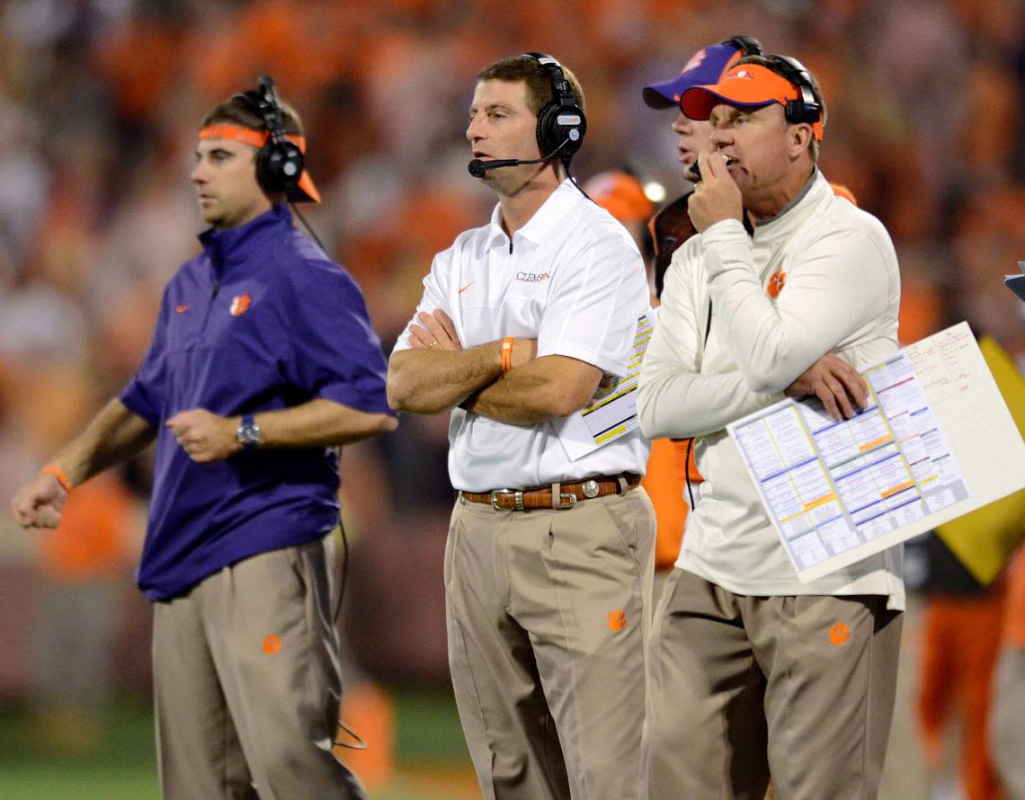 Chad Morris (right) was the offensive coordinator at Clemson under Dabo Swinney (left) earlier in his career.
