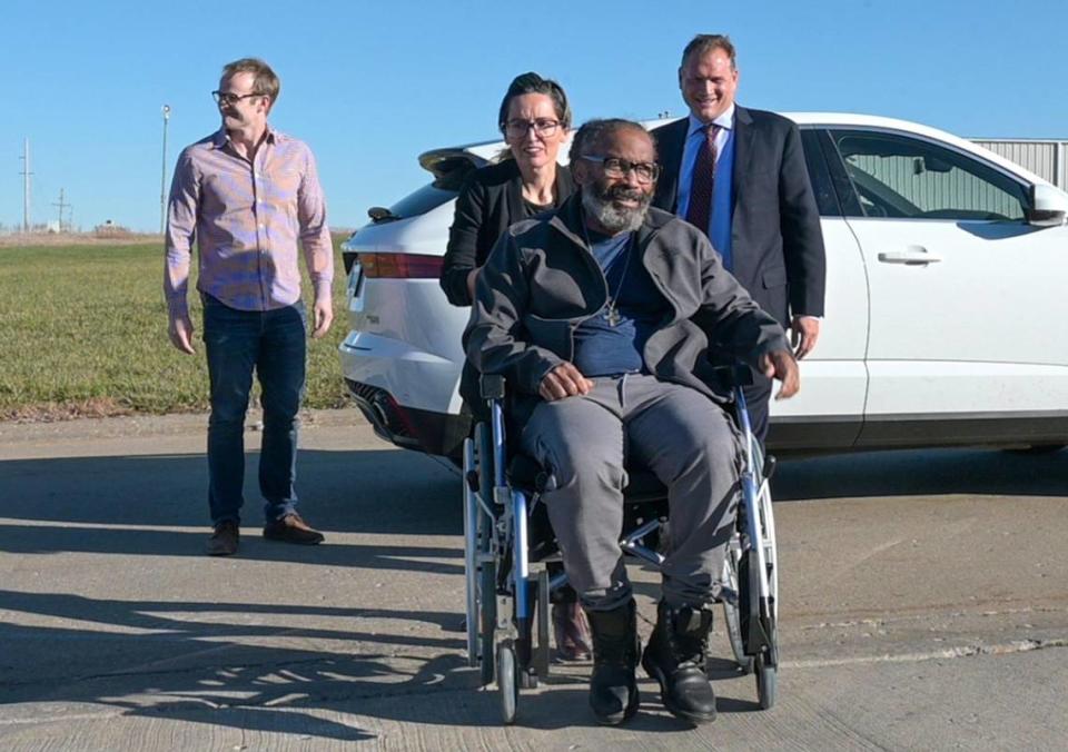 “They knew from Day One that I didn’t commit this crime,” Kevin Strickland said of police and prosecutors as his lawyers Tricia Rojo Bushnell, an attorney with the Midwest Innocence Project and attorney Robert Hoffman, right, of Bryan Cave Leighton Paisner, wheeled Strickland to meet the media after he was freed from prison Tuesday, Nov. 23, 2021, in Cameron, Missouri. Strickland spent 43 years in prison for a wrongful incarceration until a judge vacated his conviction.