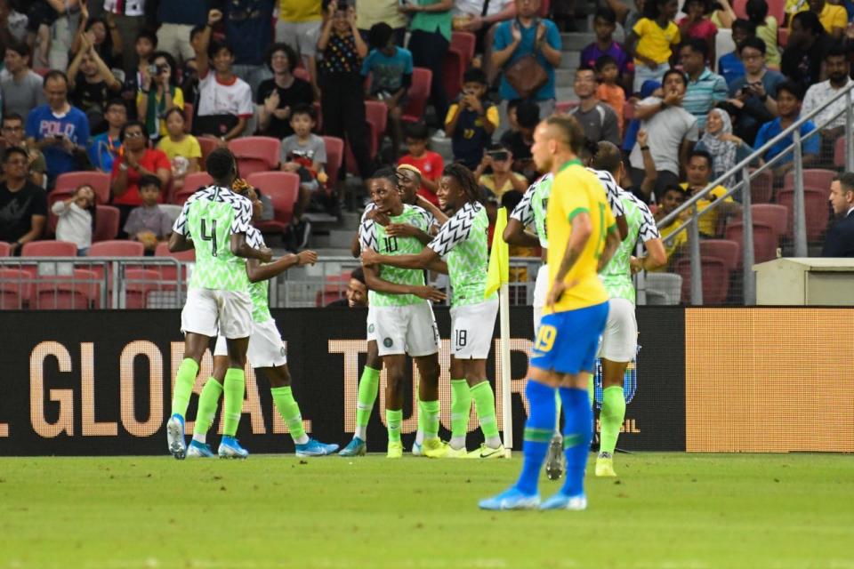 Nigeria players celebrate Joe Aribo's (jersey No. 10) goal against Brazil in their international friendly at National Stadium (PHOTO: Stefanus Ian/Yahoo News Singapore)