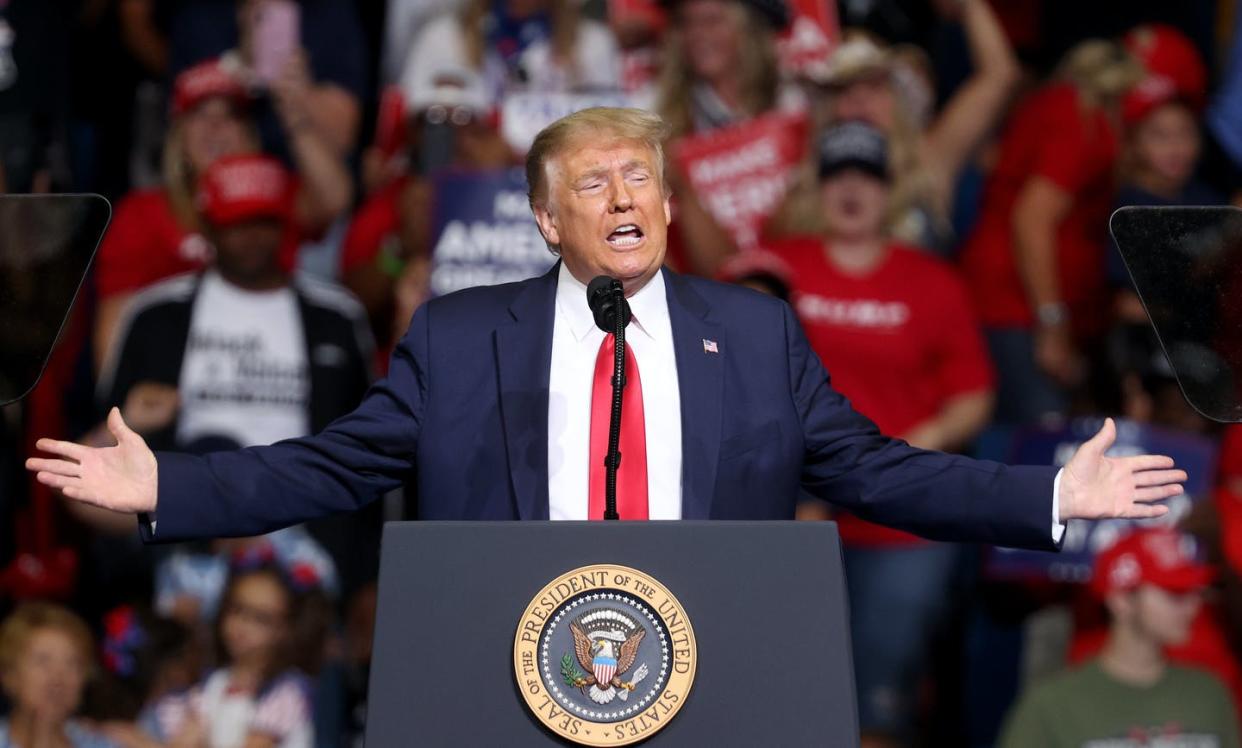 <span class="caption">President Donald Trump at the Tulsa campaign rally, where he said he had slowed down COVID-19 testing to keep the numbers low.</span> <span class="attribution"><a class="link " href="https://www.gettyimages.com/detail/news-photo/president-donald-trump-arrives-at-a-campaign-rally-at-the-news-photo/1251044223?adppopup=true" rel="nofollow noopener" target="_blank" data-ylk="slk:Win McNamee/Getty Images;elm:context_link;itc:0;sec:content-canvas">Win McNamee/Getty Images</a></span>