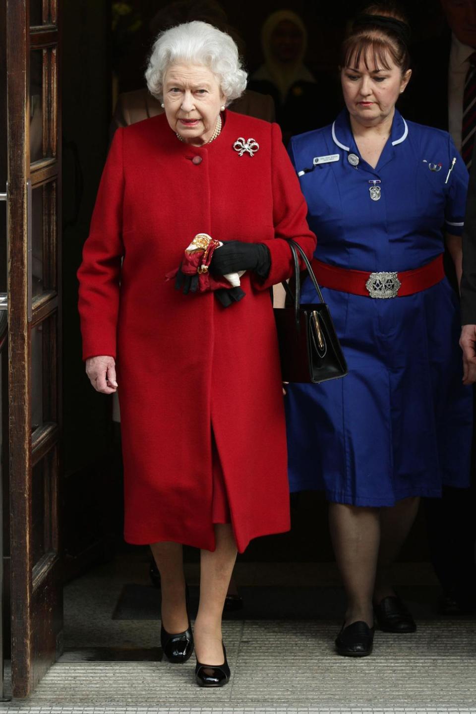 Queen Elizabeth II leaving King Edward VII Hospital after being treated there in 2013 (PA)