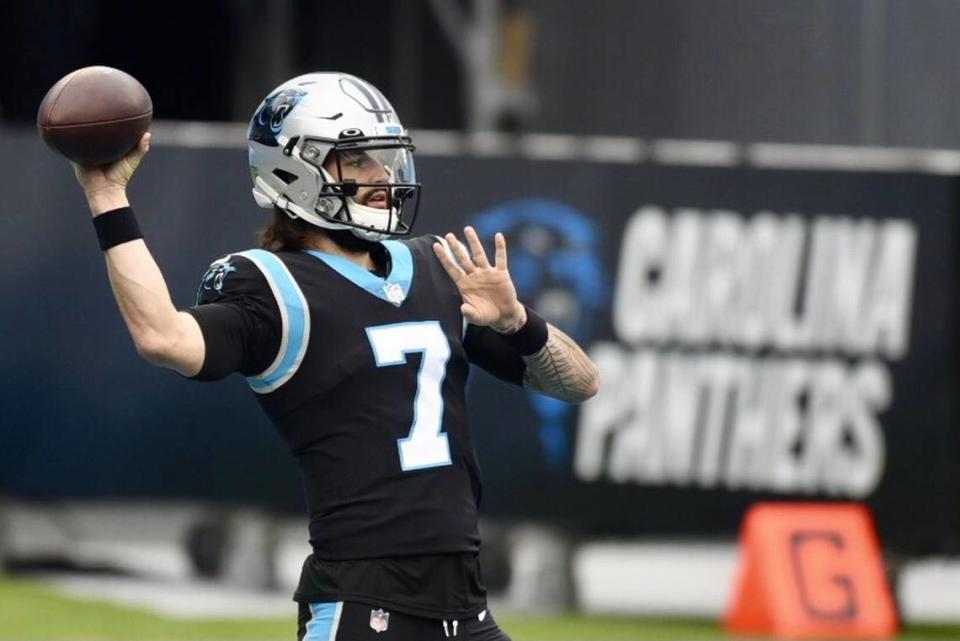 Panthers quarterback Will Grier passes to a receiver during a warmup on Sunday, November 22, 2020.