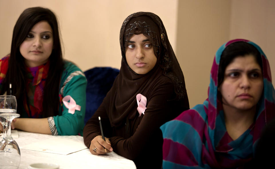 In this Wednesday, Oct. 30, 2013 photo, Pakistani women listen to a lecture organized by the breast cancer awareness group PinkRibbon in Islamabad, Pakistan. One in nine women in Pakistan will face breast cancer during their life, with the country itself having the highest rate of the disease across Asia, according to the breast cancer awareness group PinkRibbon, oncologists and other aid groups. Yet discussing it remains taboo in a conservative, Islamic culture where the word breast is associated with sexuality instead of health and many view it as immoral for women to go to the hospital for screenings or discuss it even within their family. (AP Photo/B.K. Bangash)