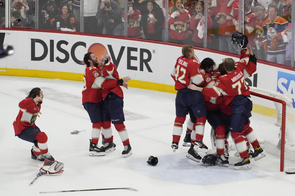 Florida Panthers players celebrate after defeating the Edmonton Oilers in Game 7 of the NHL hockey Stanley Cup Final, Monday, June 24, 2024, in Sunrise, Fla. The Panthers defeated the Oilers 2-1. (AP Photo/Rebecca Blackwell)