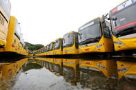 New buses are seen near Shwedagon Pagoda in Yangon, Myanmar July 21, 2017. REUTERS/Soe Zeya Tun