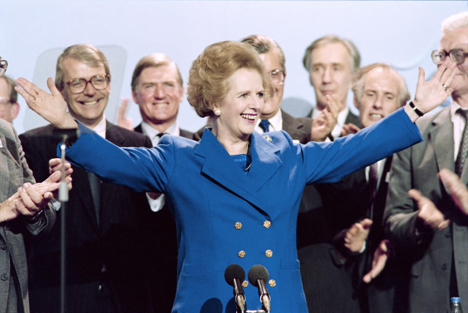 Prime Minister Thatcher acknowledges applause on Oct. 13, 1989, at the Conservative Party conference in Blackpool. (Photo: Johnny Eggitt/AFP/Getty Images)