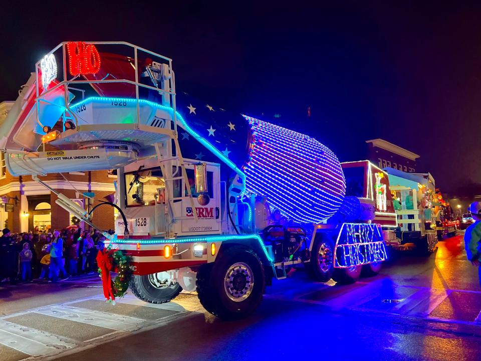 Always an annual favorite, Smyrna Ready Mix brings its illuminated cement truck to downtown Columbia during the 37th annual Columbia Main Street Christmas Parade.