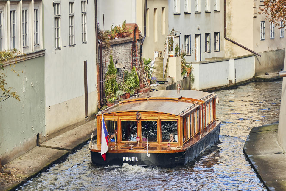 Pleasure ship Praha in the Canal Certovka, Devil's Canal, also called Little Prague Venice in Prague.