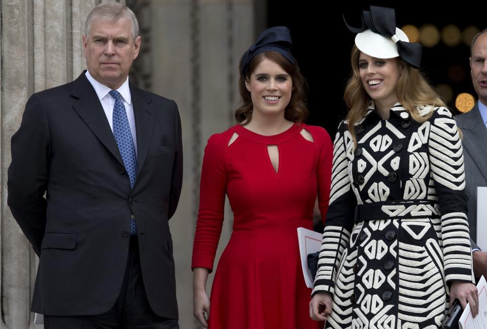 Britain's Prince Andrew (L), Britain's Princess Eugenie of York (2nd L), Britain's Princess Beatrice of York (R) leave after attending a national service of thanksgiving for the 90th birthday of Britain's Queen Elizabeth II at St Paul's Cathedral in London on June 10, 2016, which is also the Duke of Edinburgh's 95th birthday. Britain started a weekend of events to celebrate the Queen's 90th birthday. The Queen and the Duke of Edinburgh along with other members of the royal family will attend a national service of thanksgiving at St Paul's Cathedral on June 10, which is also the Duke of Edinburgh's 95th birthday. / AFP / JUSTIN TALLIS (Photo credit should read JUSTIN TALLIS/AFP via Getty Images)