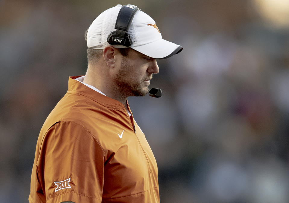 Texas head coach Tom Herman walks the sideline during an NCAA college football game against Baylor, Saturday, Nov. 23, 2019, in Waco, Texas. (Nick Wagner/Austin American-Statesman via AP)