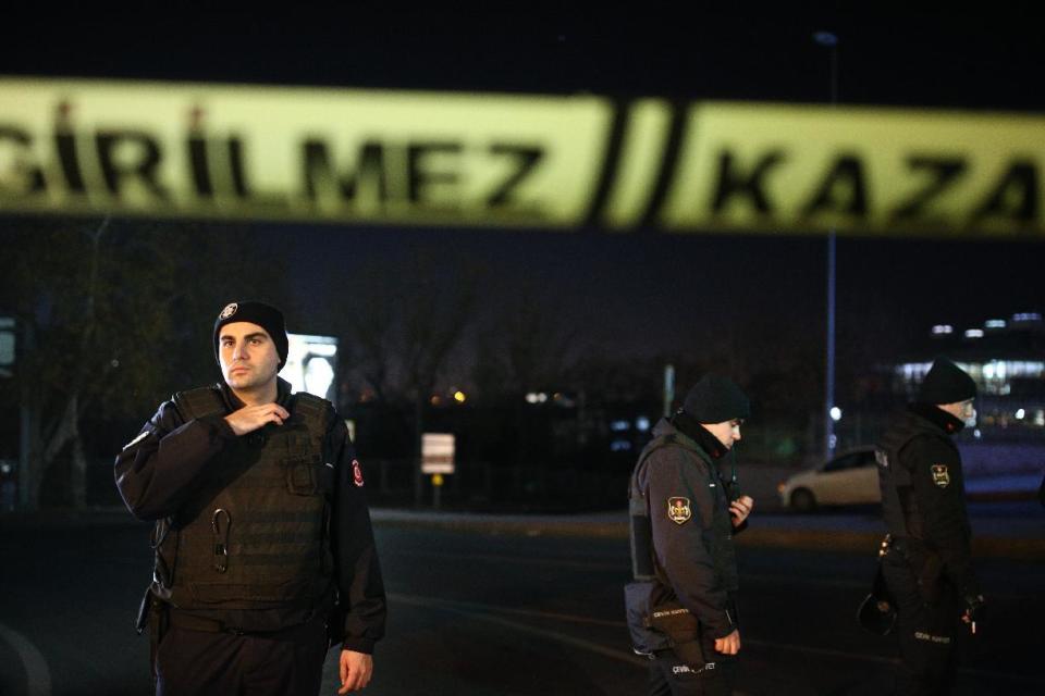 Turkish police officer cordon off the roads leading to the area of the Besiktas football club stadium, in Istanbul, late Saturday, Dec. 10, 2016. Two loud explosions have been heard near the newly built soccer stadium and witnesses at the scene said gunfire could be heard in what appeared to have been an armed attack on police. Turkish authorities have banned distribution of images relating to the Istanbul explosions within Turkey. (AP Photo/Emrah Gurel) TURKEY OUT
