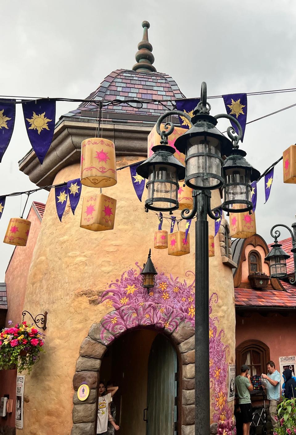 The lanterns near the "Tangled" theme restrooms on the edge of Magic Kingdom's Fantasyland light up at night, like in the movie.