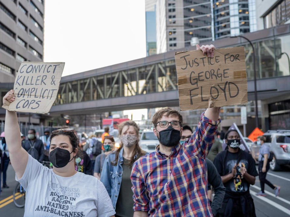 Protesters march during the trial in Minneapolis.<span class="copyright">Ruddy Roye for TIME</span>