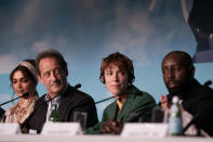 Jury member Deepika Padukone, from left, jury president Vincent Lindon, jury members Rebecca Hall, and Ladj Ly speak at the press conference for the jury at the 75th international film festival, Cannes, southern France, Tuesday, May 17, 2022. (AP Photo/Petros Giannakouris)