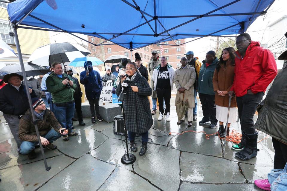 JerriAnne Boggis of the Black Heritage Trail of New Hampshire speaks in support of Mamadou Dembele during a protest held at the African Burying Ground Memorial Park in Portsmouth Sunday, Dec. 3, 2023.