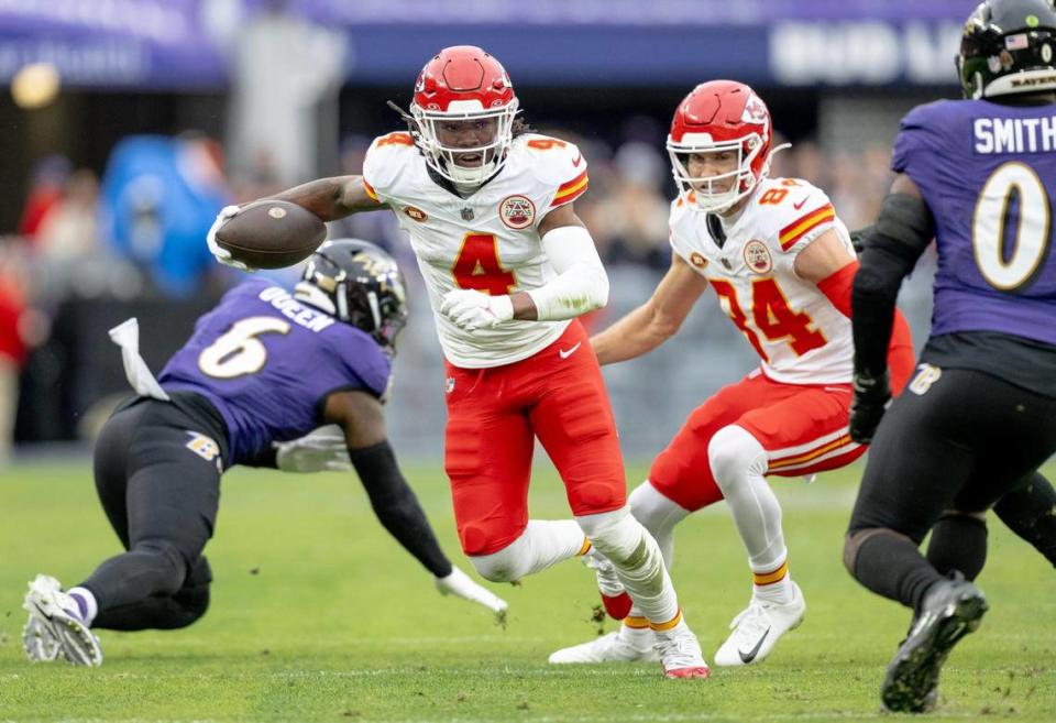 Kansas City Chiefs wide receiver Rashee Rice (4) runs with the ball against the Baltimore Ravens during the AFC Championship Game on Sunday, Jan. 28, 2024, in Baltimore.