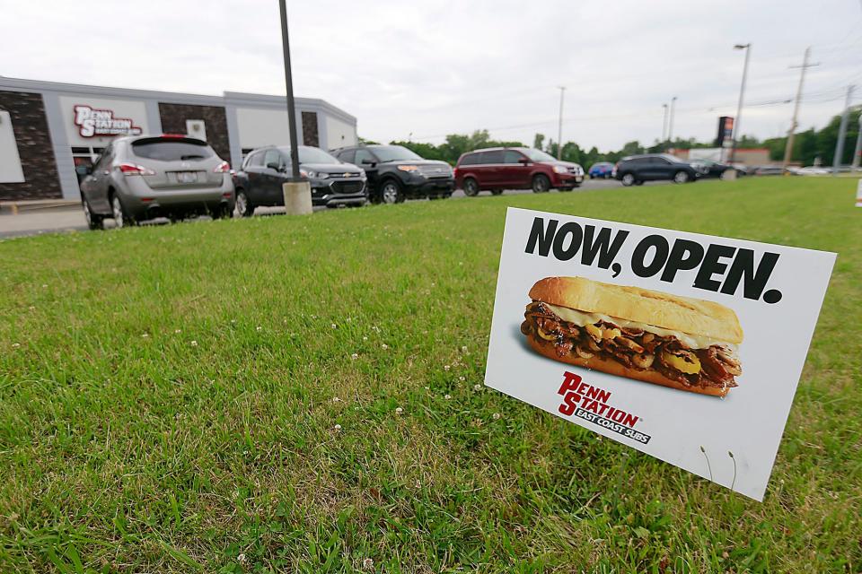 This sign is helping bring in customers one the first day of business Monday for Penn Station East Coast Subs in Ashland on Sugarbush Drive.