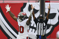 Tampa Bay Buccaneers running back Ke'Shawn Vaughn (30) celebrates after scoring against the Los Angeles Chargers during the second half of an NFL football game Sunday, Oct. 4, 2020, in Tampa, Fla. (AP Photo/Jason Behnken)