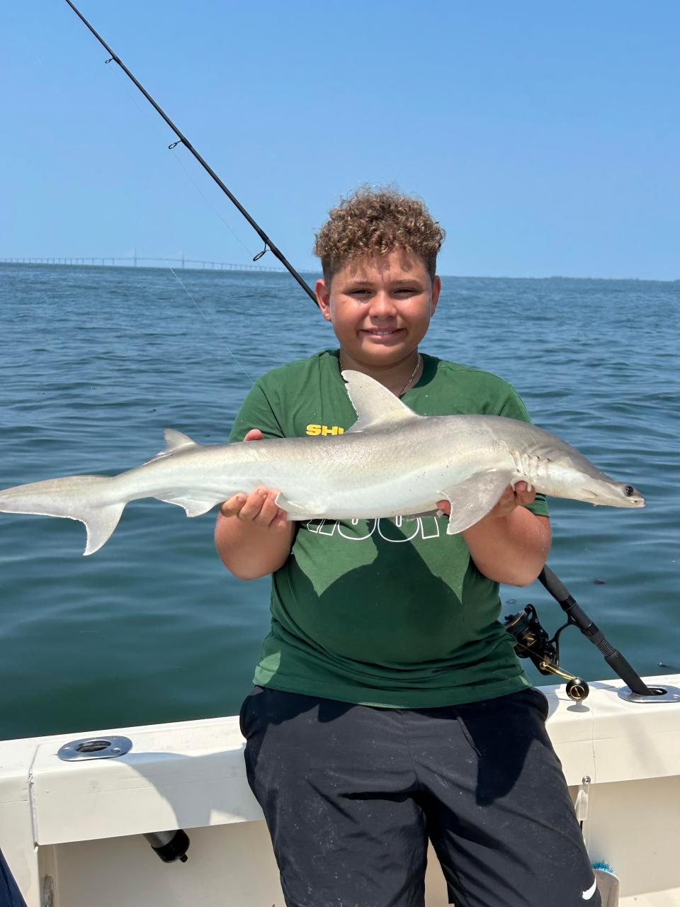 Joey Maraffa, 14, caught a shark while out on a charter fishing trip for his birthday with Take a Kid Fishing LLC.