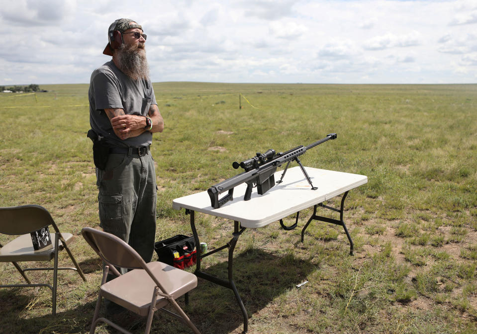 <p>A member of self-described patriot groups and militias prepares to shoot a .50 caliber rifle during III% United Patriots’ Field Training Exercise outside Fountain, Colo., July 29, 2017. (Photo: Jim Urquhart/Reuters) </p>