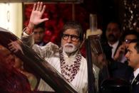 FILE PHOTO: File picture of Bollywood actor Amitabh Bachchan waving to fans