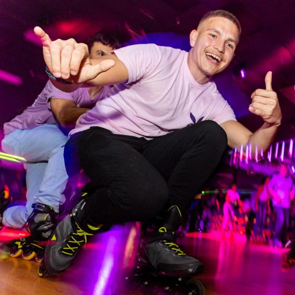 A roller-skater reacts as he goes around the rink during a skating party to mark the official closing of Super Wheels in Miami, Florida, on Saturday, November 25, 2023.