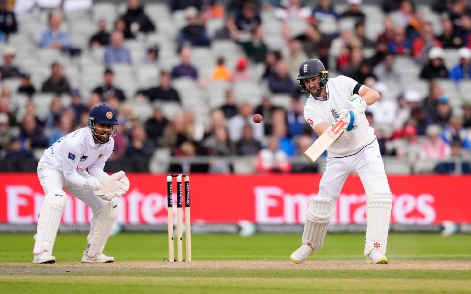 England's Chris Woakes during day two of the First Rothesay Test match at the Emirates Old Trafford, Manchester. Picture date: Thursday August 22, 2024.