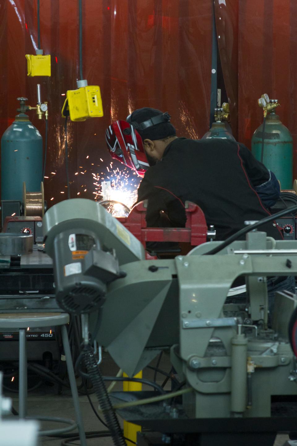 A Stark State College student uses the welding equipment at the college's Welding and Joining Center in Akron, which opened last fall. Stark State plans to open a 13-booth Welding and Joining Center at its Jackson Township campus in August 2024.