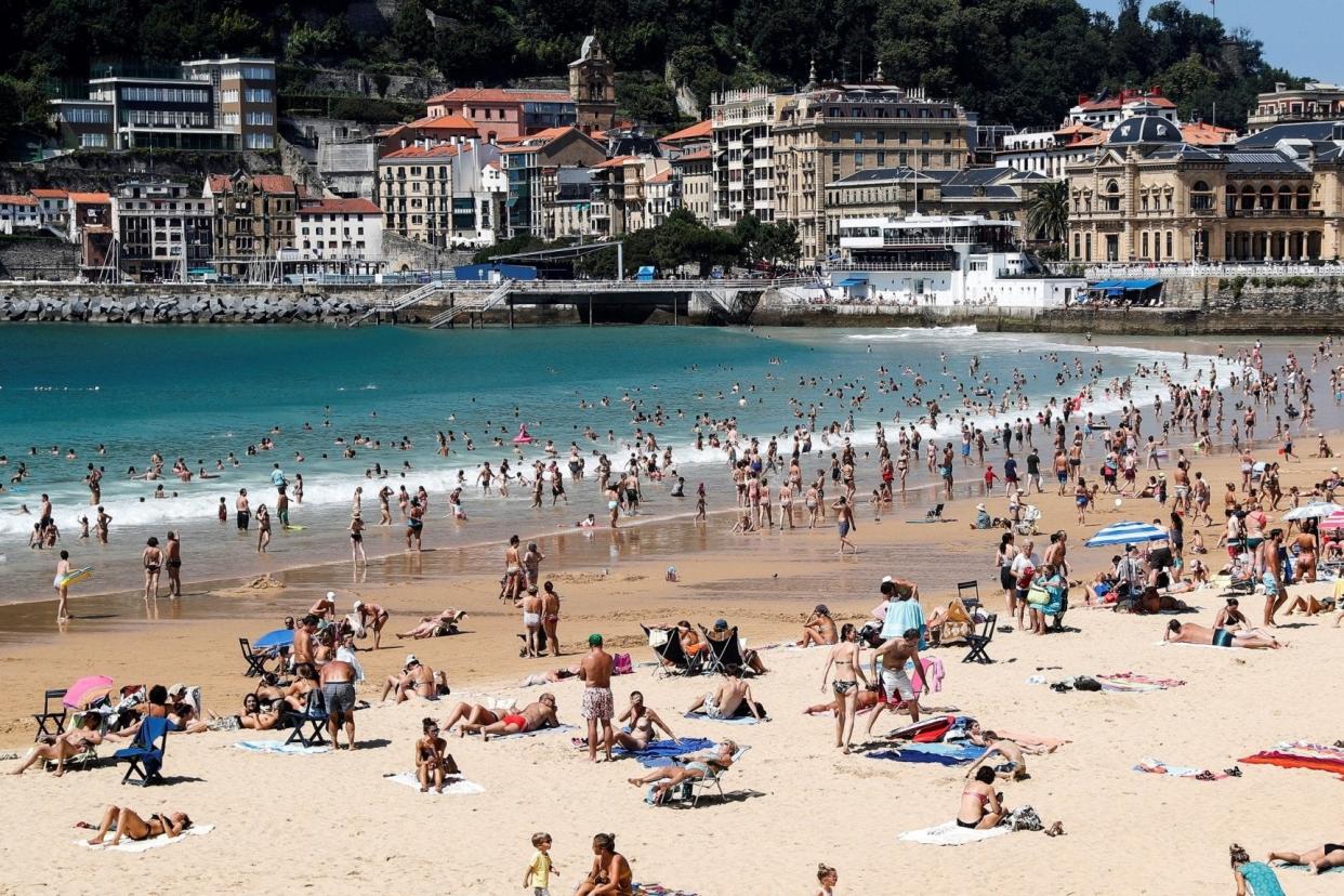 Scorching heat: Holidaymakers bask in northern Spain: EPA