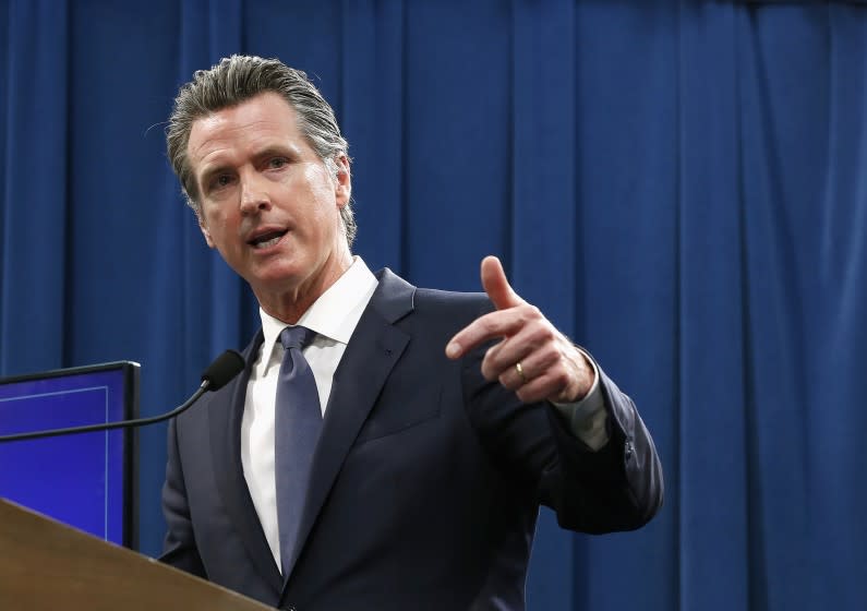 Gov. Gavin Newsom discusses his revised 2019-2020 state budget during a news conference Thursday, May 9, 2019, in Sacramento, Calif. Newsom, a Democrat, has proposed a $213.5 billion a spending plan. (AP Photo/Rich Pedroncelli)