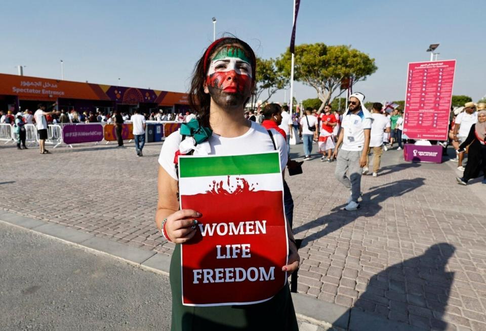 A number of Iran fans protested on Monday (Reuters)