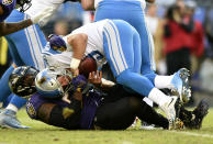 <p>Baltimore Ravens outside linebacker Terrell Suggs, bottom, sacks Detroit Lions quarterback Matthew Stafford in the second half of an NFL football game, Sunday, Dec. 3, 2017, in Baltimore. (AP Photo/Gail Burton) </p>