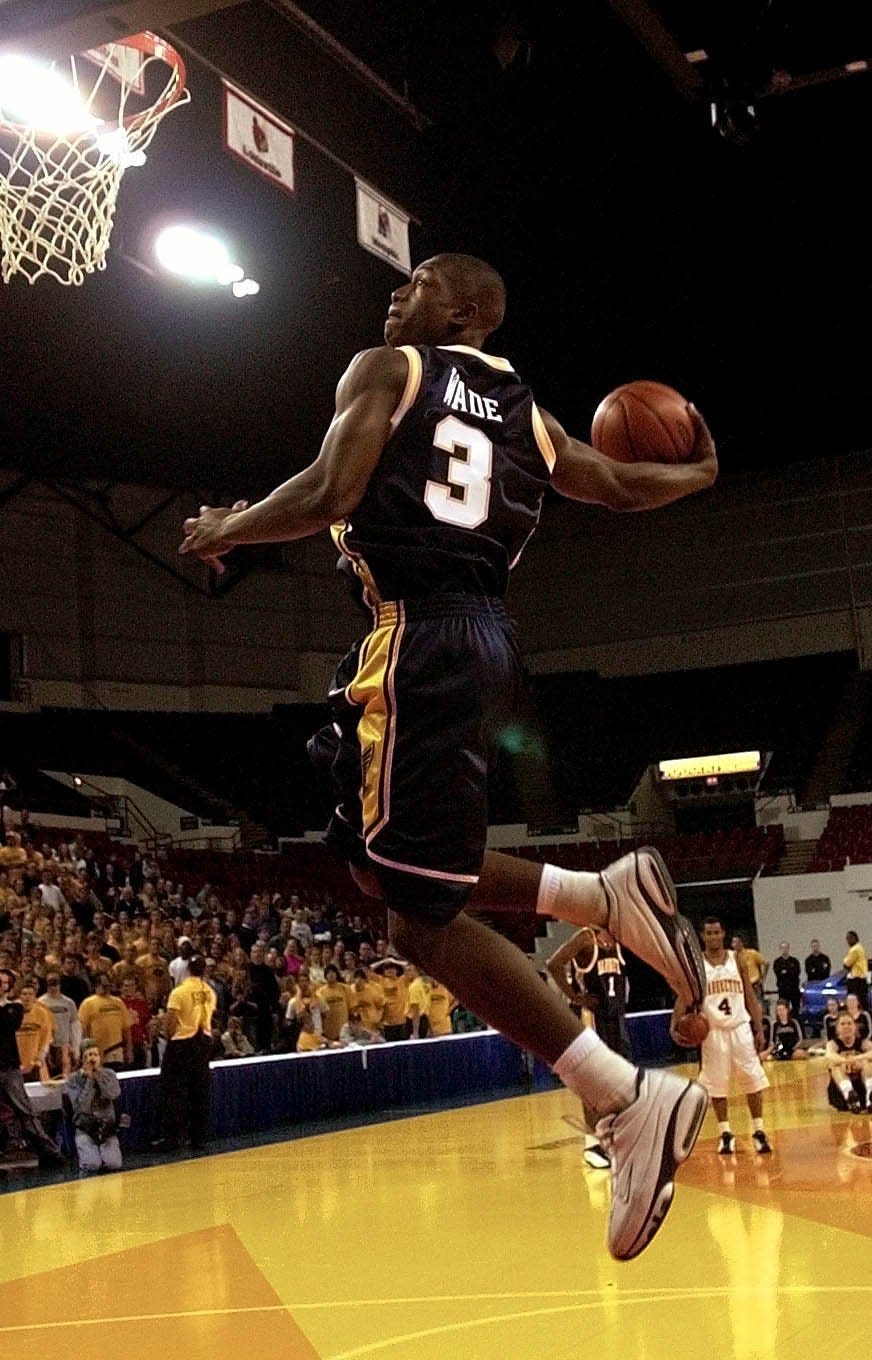 Dwyane Wade's high-flying exploits were only seen in practice during his first season at Marquette. As a partial qualifier, Wade couldn't play in games.