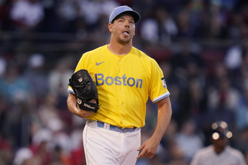 Boston Red Sox starting pitcher Rich Hill reacts after giving up a solo home run to Detroit Tigers' Javier Baez during the third inning of a baseball game, Tuesday, June 21, 2022, at Fenway Park, in Boston. (AP Photo/Charles Krupa)