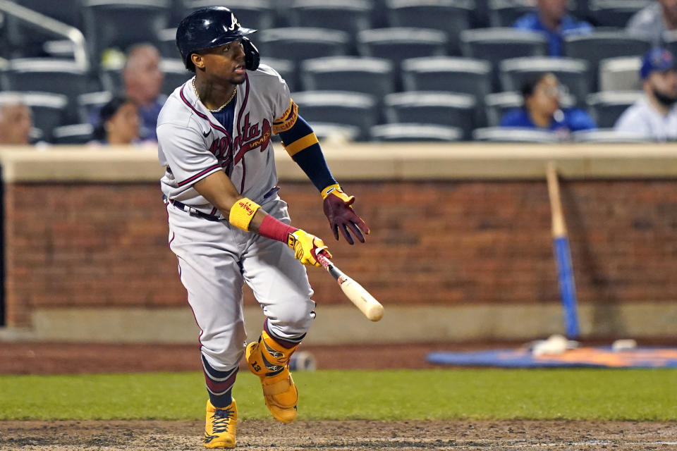 Atlanta Braves' Ronald Acuña Jr. watches his fifth-inning, solo home run off New York Mets relief pitcher Miguel Castro (50) in the second baseball game of a doubleheader, Monday, June 21, 2021, in New York. (AP Photo/Kathy Willens)