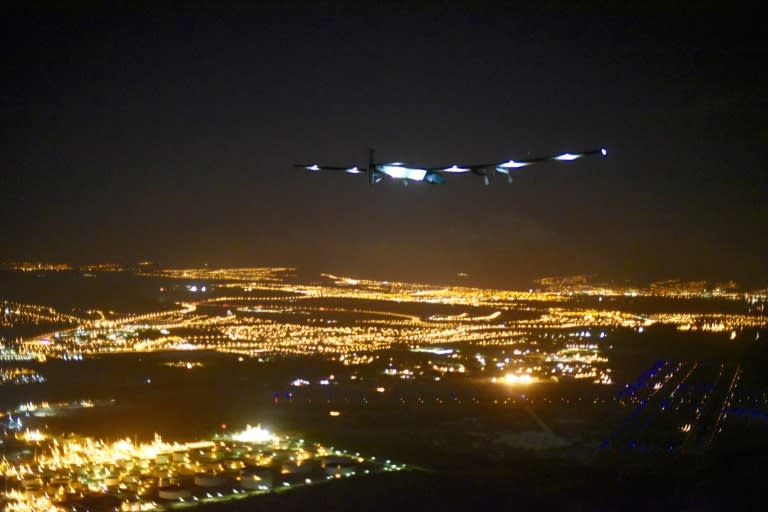 This photo provided by the Solar Impulse project on July 3, 2015, shows Solar Impulse 2 as it is about to land in Hawaii with André Borschberg at the controls