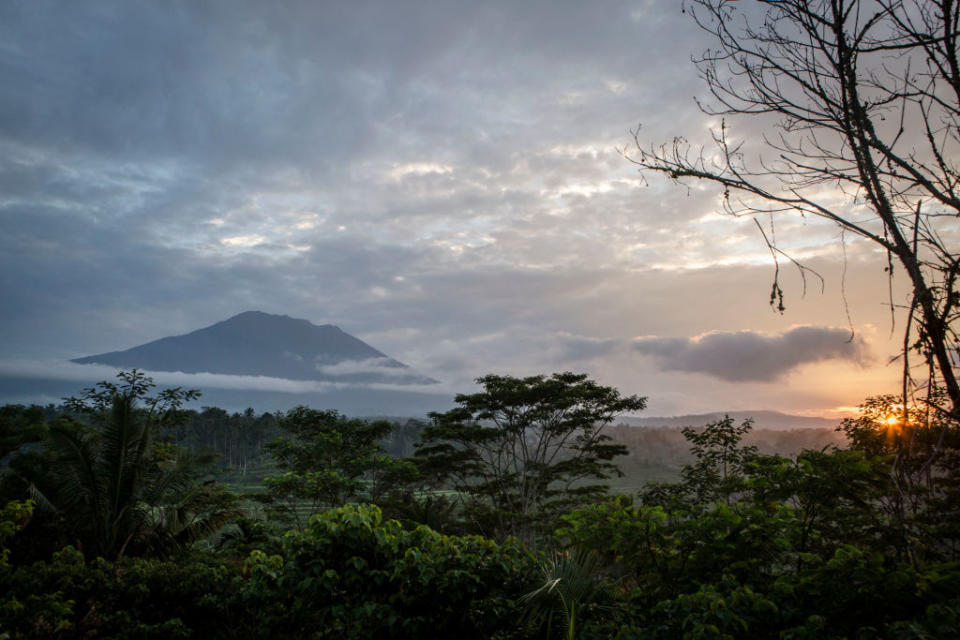 <p>A view of mount Agung in Karangasem regency, Island of Bali, Indonesia. Indonesian authorities raised the alert level for the Mount Agung volcano to the highest level as up to 50,000 villagers around the mountain evacuated their homes and travel warnings have been issued for the popular tourist destination. (Ulet Ifansasti/Getty Images) </p>