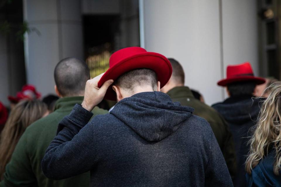 Red Hat employees walk back to their Raleigh headquarters in October 2018, the day after IBM announced it would acquire the Raleigh-based software company in a $34 billion deal.