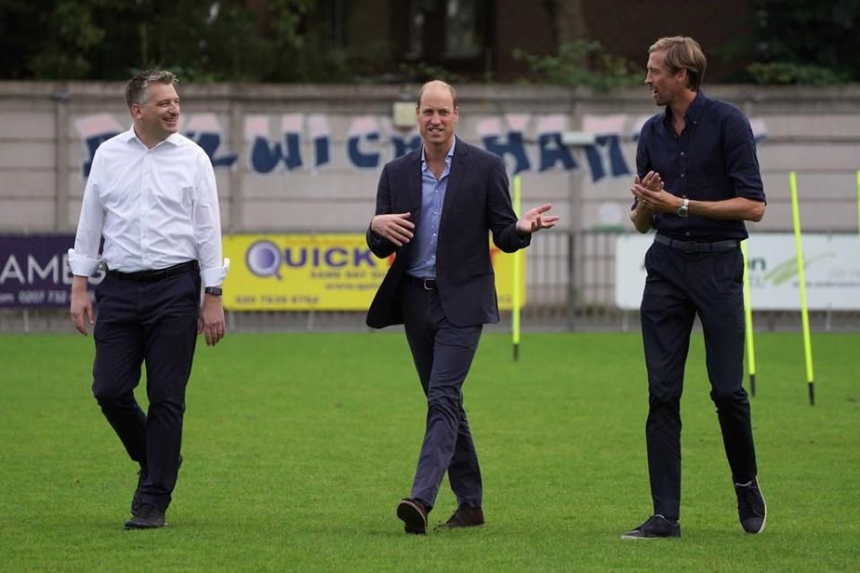 The Duke of Cambridge (centre) with Ben Clasper, chairman of Dulwich Hamlet Football Club (left) and Peter Crouch during his visit to the London club (Kirsty O’Connor/PA) (PA Wire)