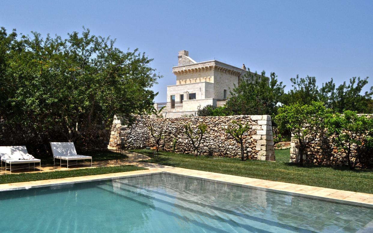 Masseria Trapana is a 16th-century farmhouse repurposed into a sophisticated eight-suite hotel with verdant walled gardens