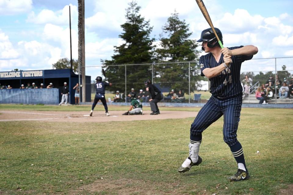 Central Catholic’s Braxton Thomas watches Manteca pitcher Colton Murillo from the on-deck circle during the Valley Oak League game in Modesto, Calif., Friday, May 5, 2023.