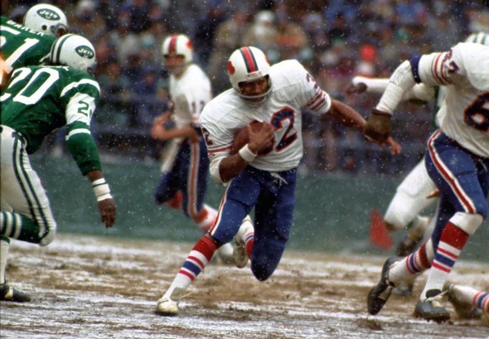 O.J. Simpson became the first player to rush for 2,000 yards in a season in 1973.