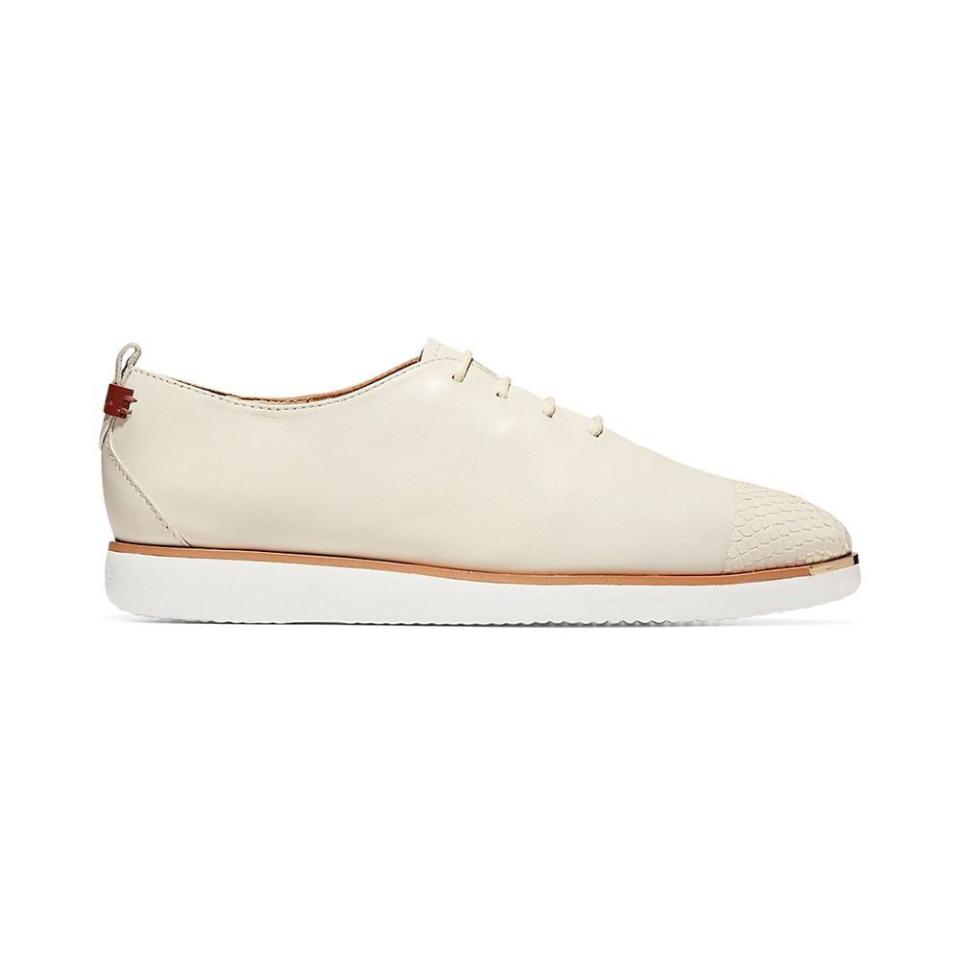 <p><strong>Cole Haan</strong></p><p>saksfifthavenue.com</p><p><strong>$63.74</strong></p><p><a href="https://go.redirectingat.com?id=74968X1596630&url=https%3A%2F%2Fwww.saksfifthavenue.com%2Fproduct%2Fcole-haan-grand-ambition-leather-sneakers-0400011839330.html&sref=https%3A%2F%2Fwww.cosmopolitan.com%2Fstyle-beauty%2Ffashion%2Fg37234945%2Fwomens-sneaker-sale-saks-fifth-avenue%2F" rel="nofollow noopener" target="_blank" data-ylk="slk:Shop Now;elm:context_link;itc:0;sec:content-canvas" class="link ">Shop Now</a></p><p>A sneaker you can wear to the office, happy hour, and beyond. </p>