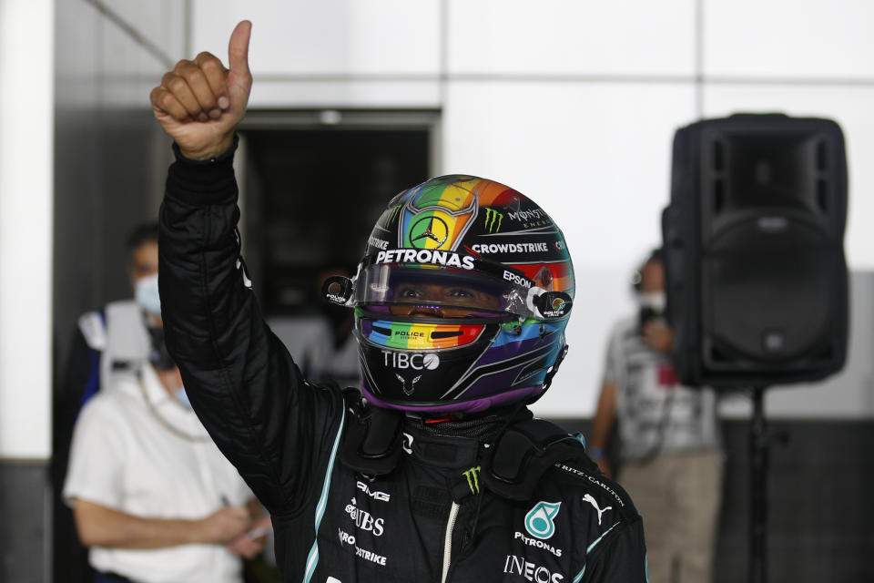 Mercedes driver Lewis Hamilton of Britain reacts after qualifying session qualifying session in Lusail, Qatar, Saturday, Nov. 20, 2021 ahead of the Qatar Formula One Grand Prix. (Hamad I Mohammed, Pool via AP)