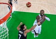 Aug 17, 2016; Rio de Janeiro, Brazil; USA guard Kyrie Irving (10) loses control of the ball against Argentina point guard Facundo Campazzo (7) during the men's basketball quarterfinals in the Rio 2016 Summer Olympic Games at Carioca Arena 1. Mandatory Credit: USA TODAY Sports